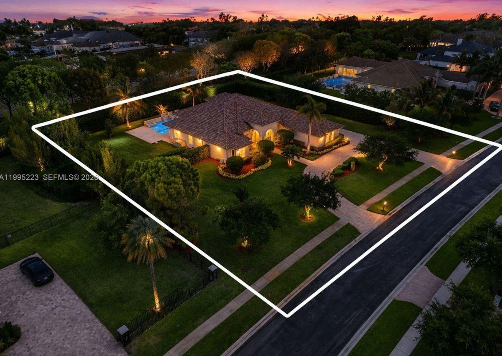 The house — aerial at sunset